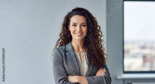 Confident Businesswoman with Curly Brown Hair – Modern Office Portrait, Stylish Professional Aesthetic