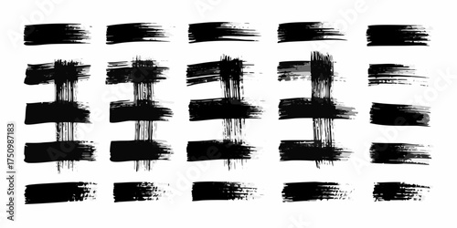 Collection of black ink brush strokes and paint splatters on a white background