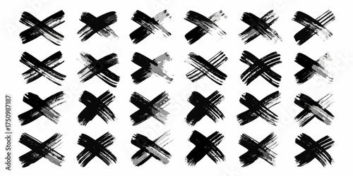 Collection of black and gray abstract brush stroke x marks on a white background
