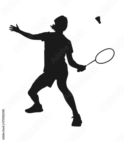 Silhouette of a badminton player in action hitting a shuttlecock with a racket