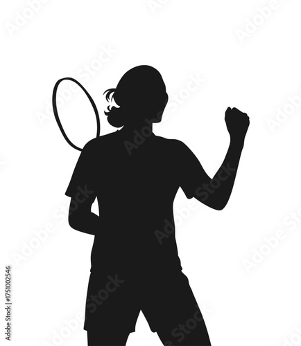 Silhouette of a triumphant female tennis player with racket raised in celebration of victory