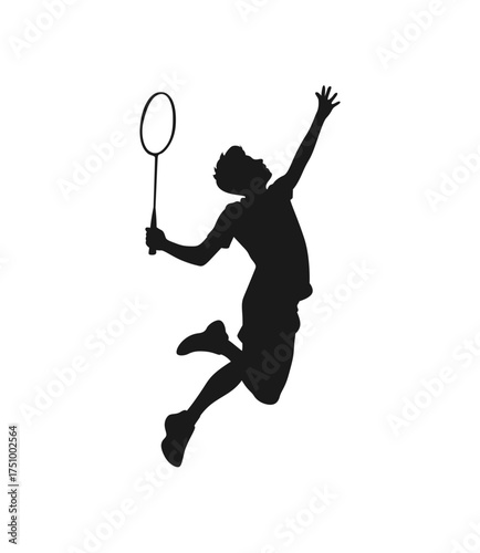 Silhouette of a badminton player in mid air during a smash shot action