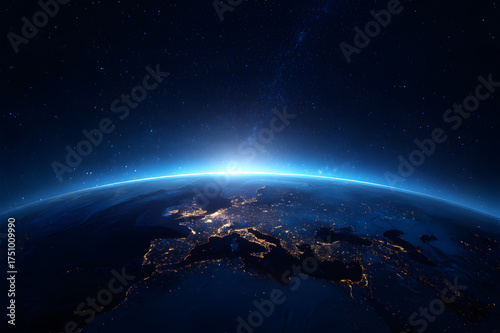 Earth planet in outer space. Earth at night from space showing illuminated cities across Europe and West Germany. dark night sky filled with stars.