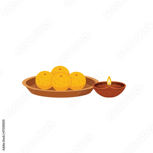 Traditional Indian Diwali Festival Celebration with Delicious Sweet Laddu on a Plate and a Lit Clay Diya Lamp
