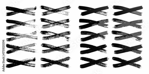 Collection of hand drawn brush stroke x marks in various shades of gray and black
