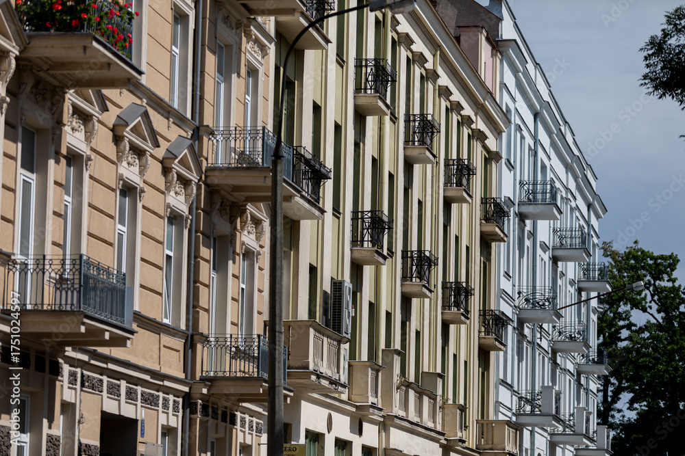 Fototapeta premium Explore the enchanting beauty of charming European architecture adorned with lovely balconies