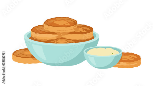 Stacked Golden Brown Pancakes in Blue Bowl with Small Bowl of Butter.