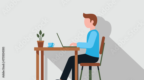 Man working on laptop at desk with plant and coffee