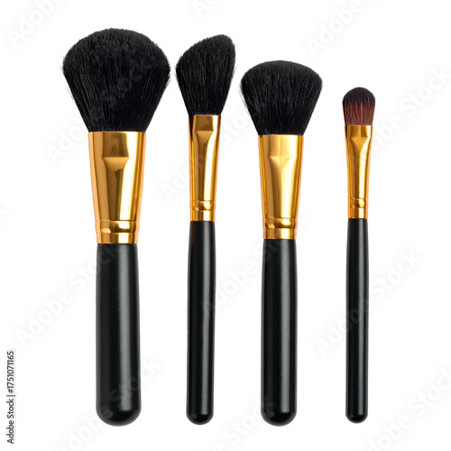 Four professional makeup brushes with black handles, gold ferules, and soft, dark bristles