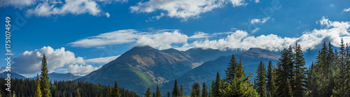 mountain panorama in the early morning with clouds