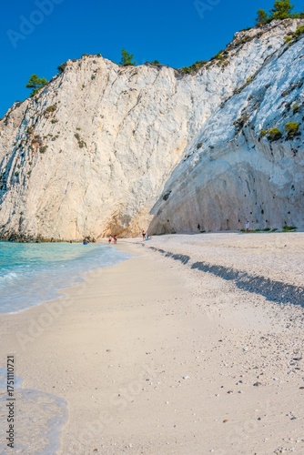 Towering White Cliffs Overlooking the Pristine White Pebble Beach and Turquoise white rocks beach in Kefalonia, Greece