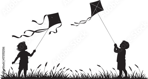 Children silhouettes flying kites in a grassy field.