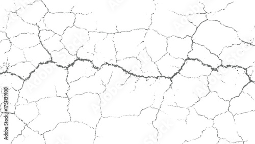 A white surface with a network of grey cracks forming an abstract pattern.