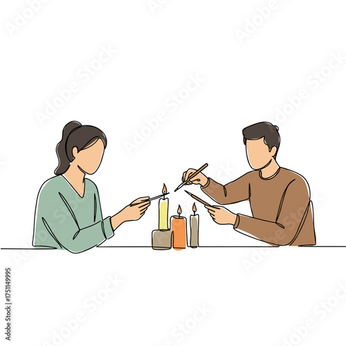 Couple making candles together with colorful wax and tools  