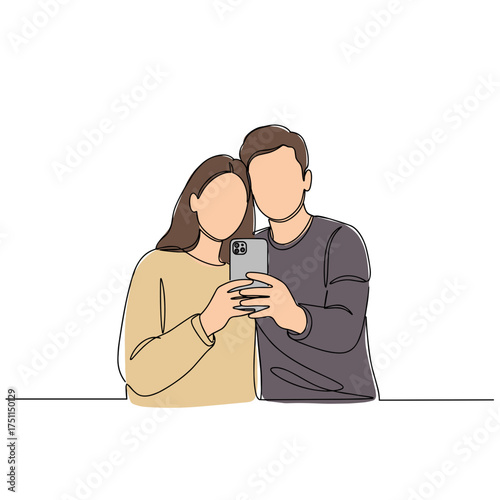 Couple taking a selfie with smartphone in casual clothing  