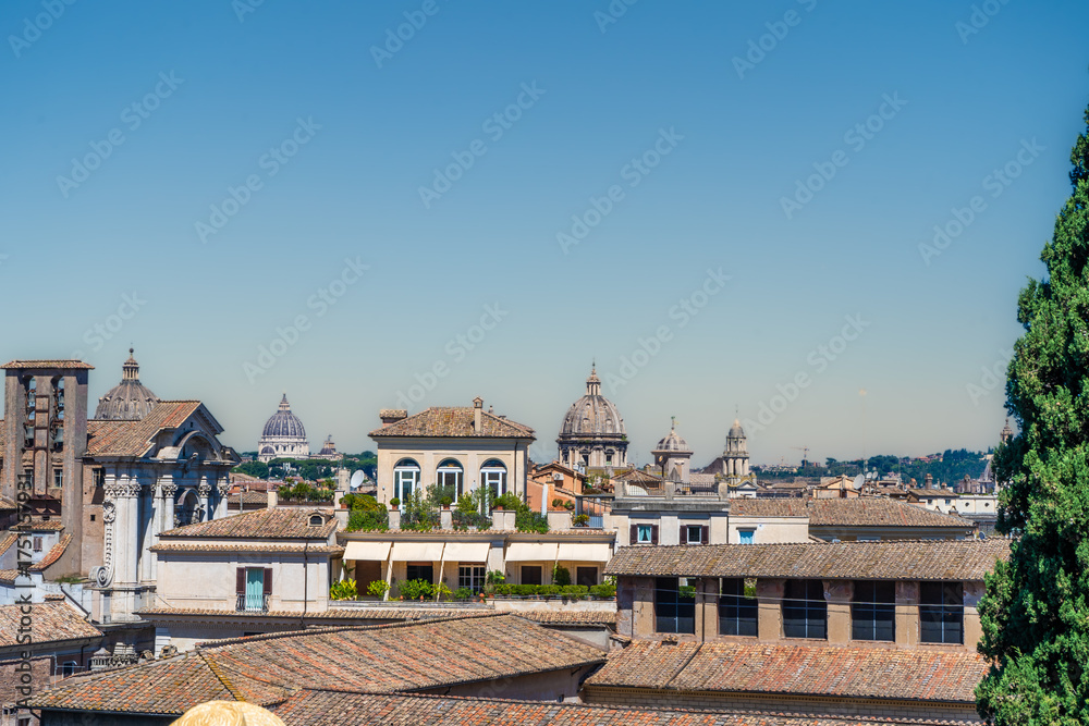 Fototapeta premium Rome Italy roofs church architecture. Italian blue sky copy space background