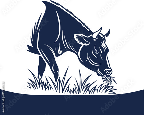 Stylized silhouette of a dark blue cow grazing in green grass with a white background