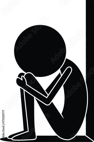 A black silhouette of a person curled up in a corner symbolizing isolation sadness and despair