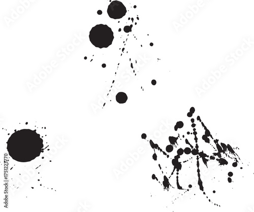 Isolated black ink spots and splatters are arranged across a plain white transparent background