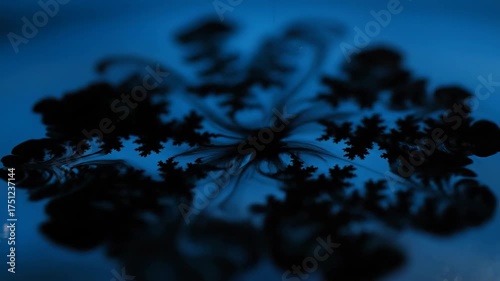 Deep blue gradient with subtle lighting and blurred details.