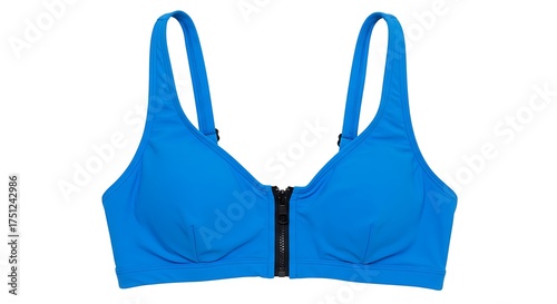 A bright blue sports bra with a black zipper closure isolated on a white background in a studio shot