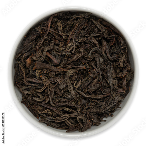Black Ceylon single estate tea (OPA grade) from the Sabaragamuwa region, Sri Lanka, loose dried leaves displayed in a white bowl, viewed from above