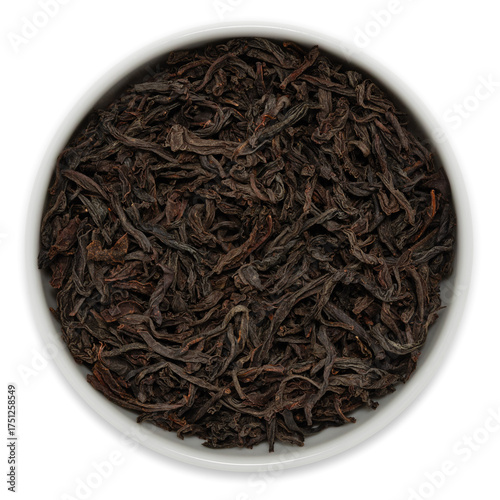 Black Ceylon single estate tea (OP grade) from the Kandy region, Sri Lanka, loose dried leaves displayed in a white bowl, viewed from above