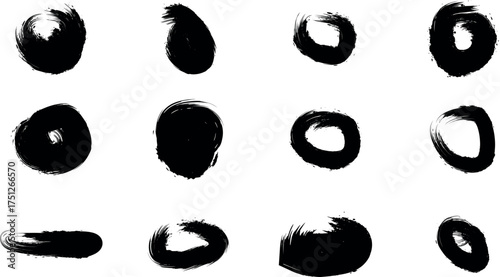Abstract black brush stroke circles and oval shapes isolated on transparent background, artistic grunge texture elements for design