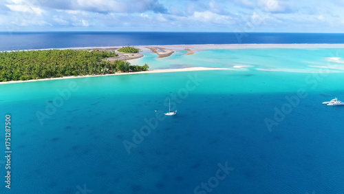 Obraz na plátně Luxury resort photo of Bora Bora tropical paradise islands with palm trees, yacht, boat