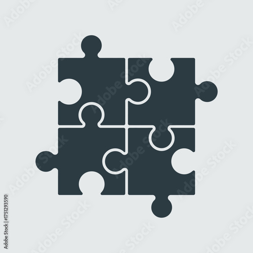The image depicts four interlocking puzzle pieces, representing teamwork, problem-solving, and collaboration essential in achieving shared goals, particularly in business and personal contexts.