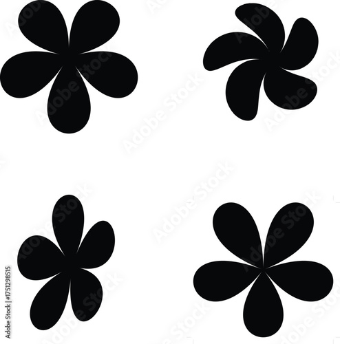 Vector art of four black flower shapes