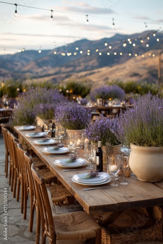 Elegant Outdoor Dining Setup With Lavender Decor and Mountains at Sunset