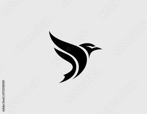 A sleek black bird logo design representing freedom and elegance, capturing the essence of flight, ideal for brands related to travel, nature, or personal growth.
