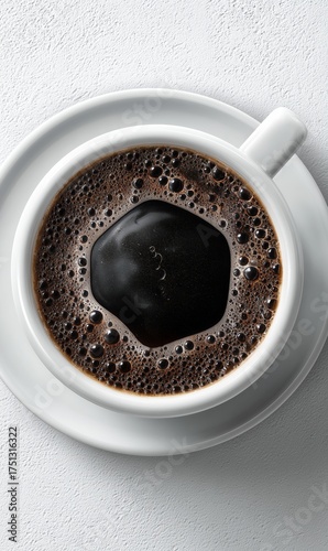 Enjoying a Hot Cup of Coffee Served in a White Ceramic Mug on a Clean Table