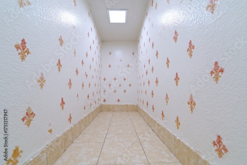 Bright Minimalist Hallway with Floral Wallpaper and Tile Flooring