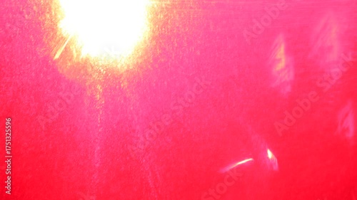 Flashes of red light on the street at night