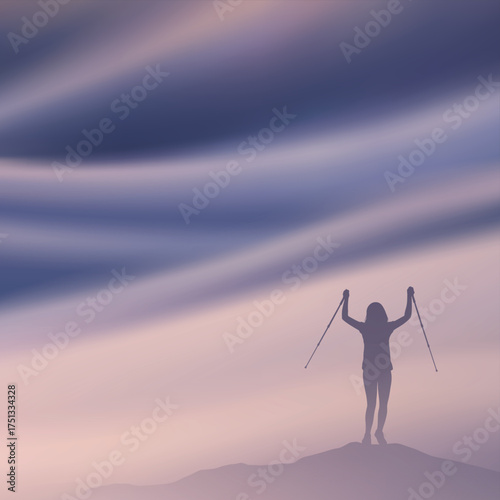 Mountain climb. Cheerful woman with trekking poles. Silhouette in fog