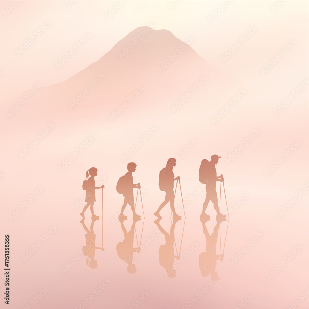 Obraz premium People with trekking poles. Family travel. Mountain silhouette in fog