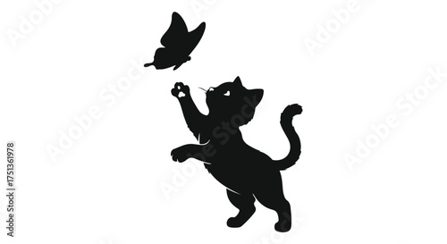 Playful black kitten reaches for a fluttering butterfly against a clean white background.