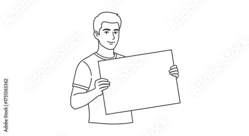 Smiling young man holding a blank sign, ready to share a message