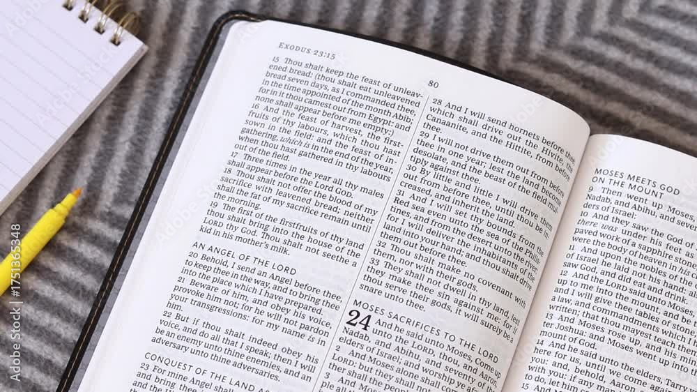 Studying from open holy bible book. Top view. Reading old testament ...