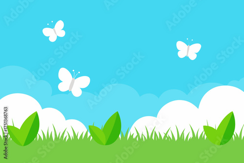 Butterflies flying over grass with clouds in sky