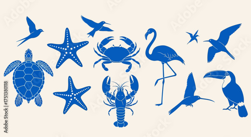 Set of tropical sea life and exotic bird illustrations. A collection of blue marine animal silhouettes including a turtle, crab, and toucan