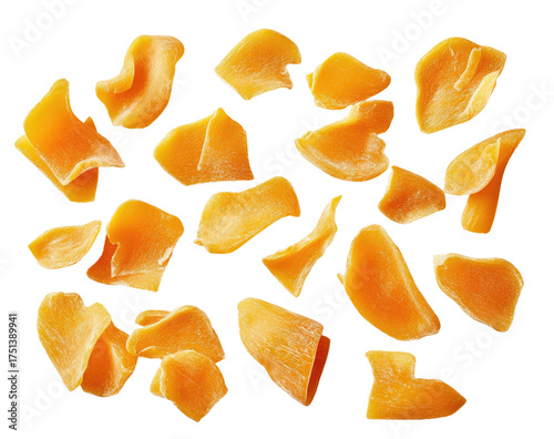 Orange mango slices scattered on black