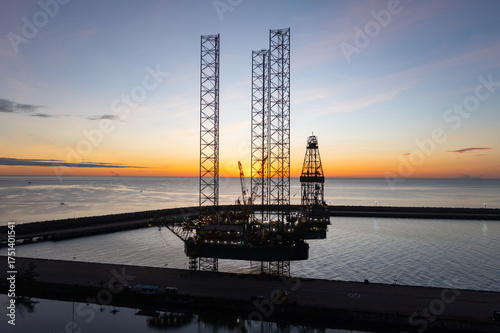 Wallpaper Mural Aerial view of offshore jack up rig in a shipyard during sunset for oil and gas exploration and production. Torontodigital.ca