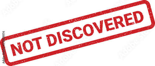 Distressed red rubber stamp clearly stating NOT DISCOVERED suitable for scientific research or historical archives