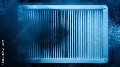 Air filter with smoke being tested in dim lighting situation