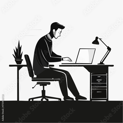 Businessman working at office desk using computer