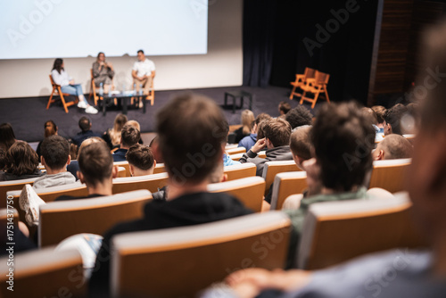 Interview and round table discussion at business convention and presentation. Audience at the conference hall. Business and entrepreneurship symposium.