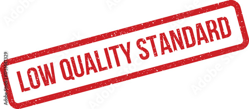 Rough textured rubber stamp clearly displaying the significant phrase low quality standard